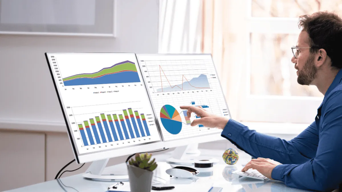 A person using an ai powered platform to analyze customer data with predictive analytics