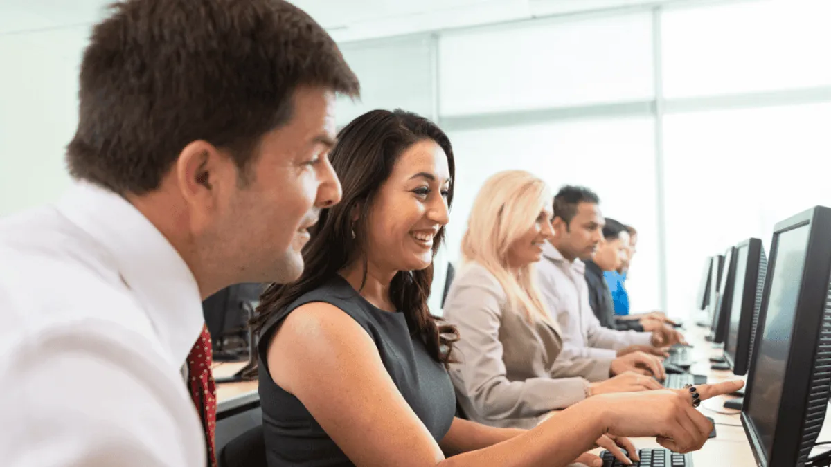 A sales team discussing implementing AI in their sales training program