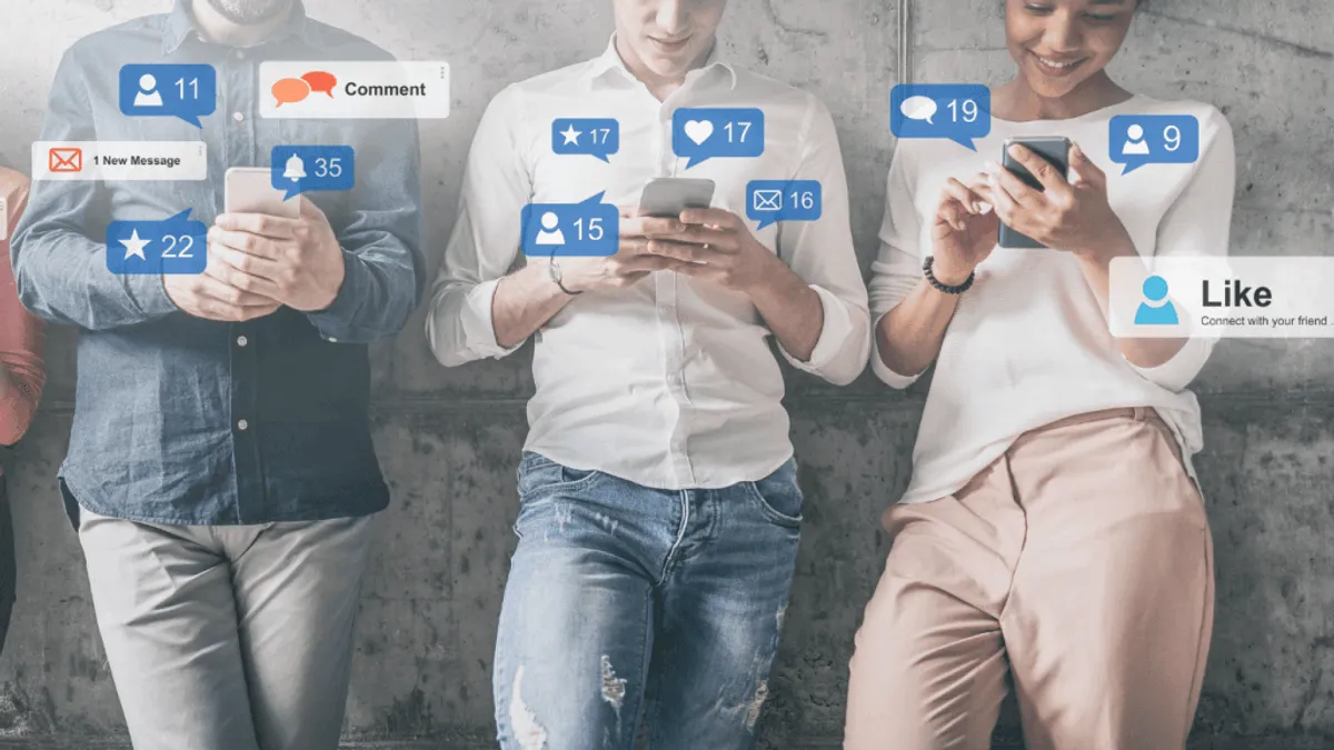 An image showing social media users on their phones on social media platforms