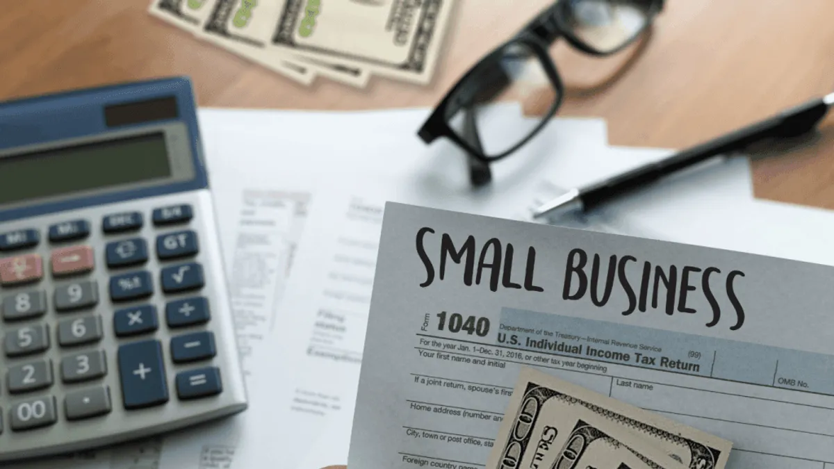 A small business owner using AI powered marketing tools to create a successful marketing campaign